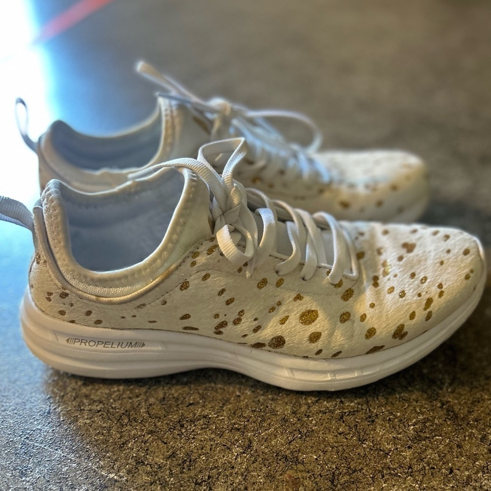 APL Phantom White and Gold Calf Hair Splatter Sneakers Size 6.5 Women’s